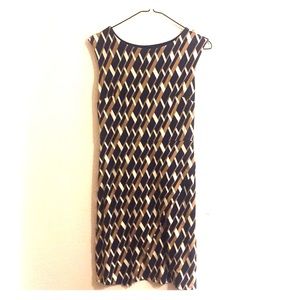 A tan and blue patterned dress